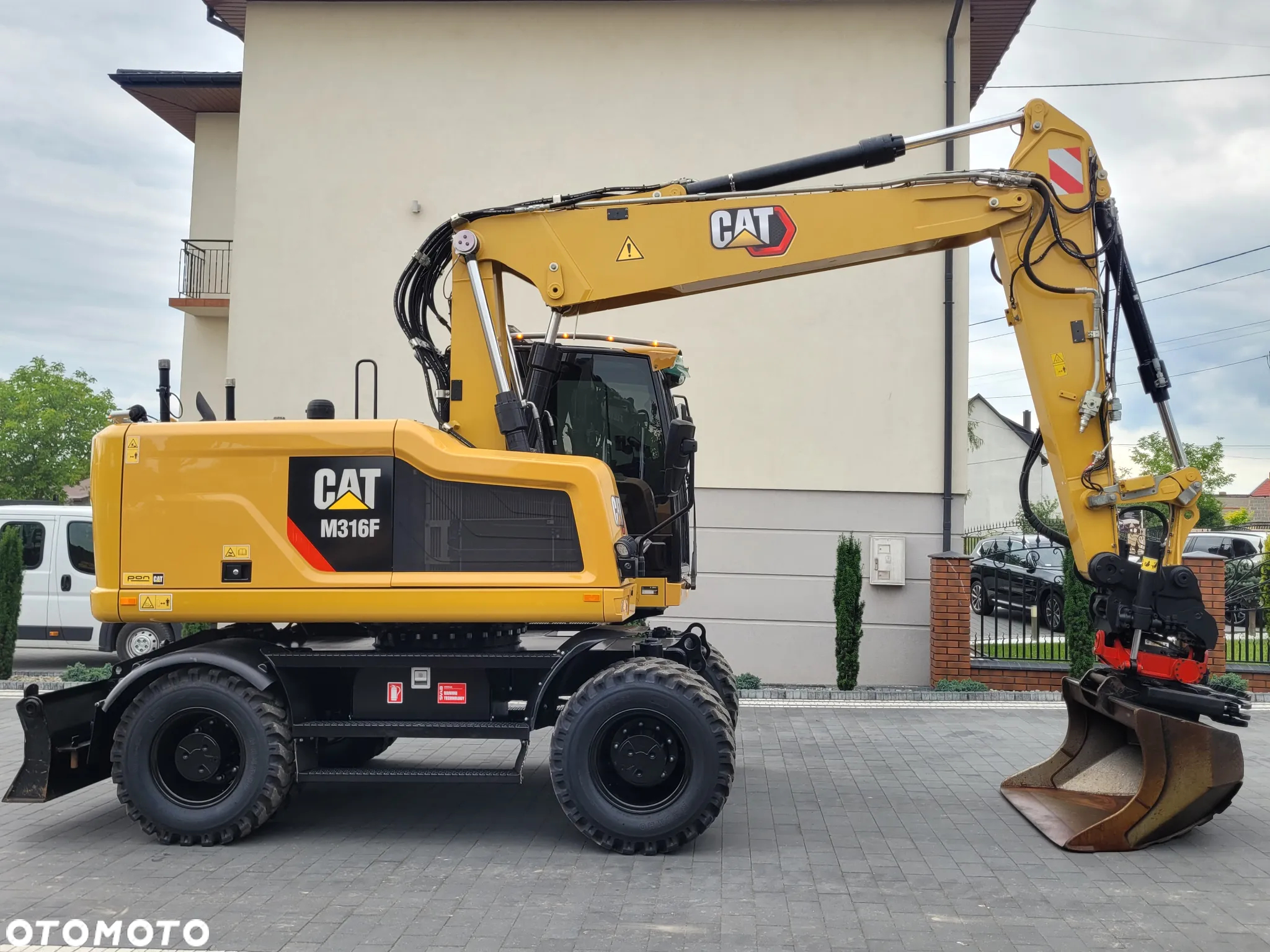 Caterpillar M316F / ROTOTILT ze szczypcami / sprowadzona / - 2