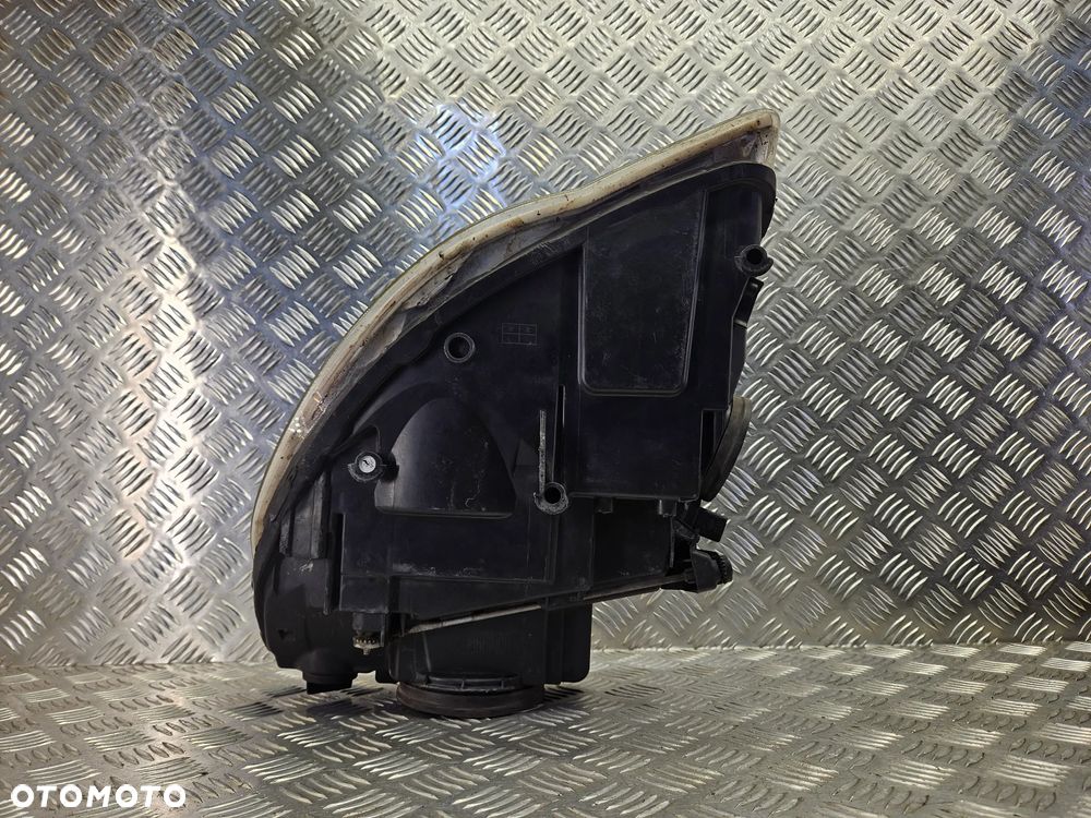 VW TOUAREG 7L LIFT 06-09R LAMPA PRZOD  PRAWA LEWA CENA ZA DWIE - 7