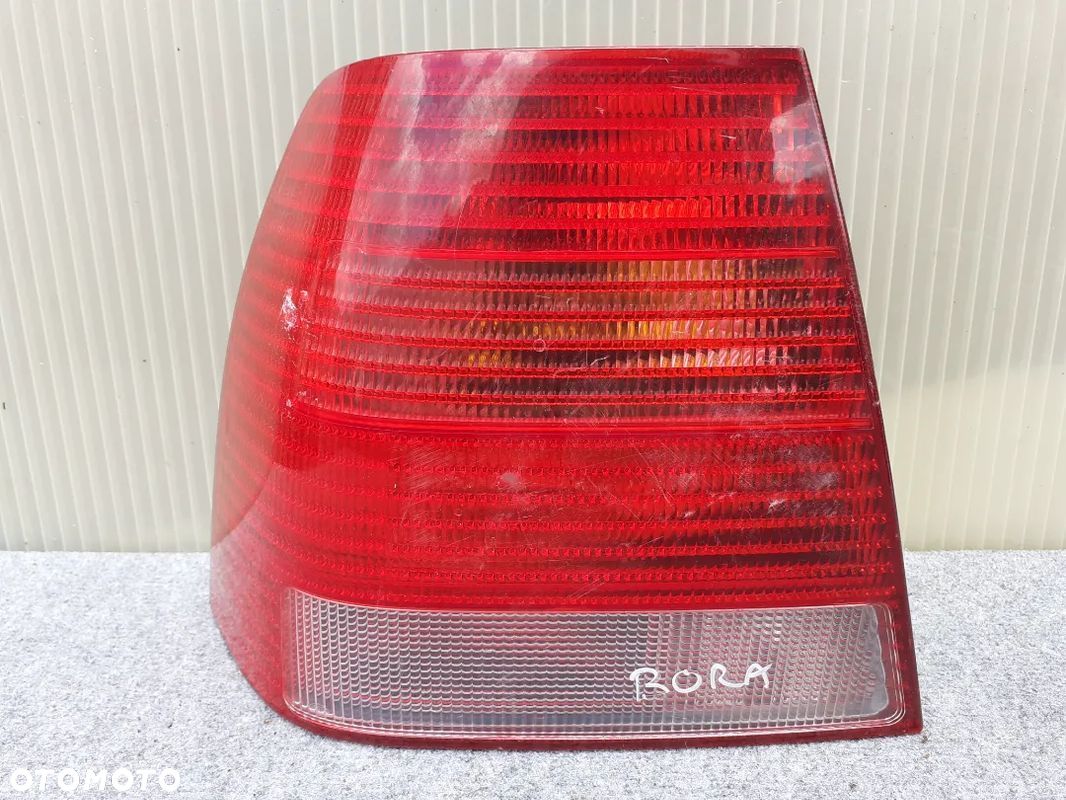 LAMPA TYŁ TYLNA LEWA VW BORA ORYGINAŁ - 1