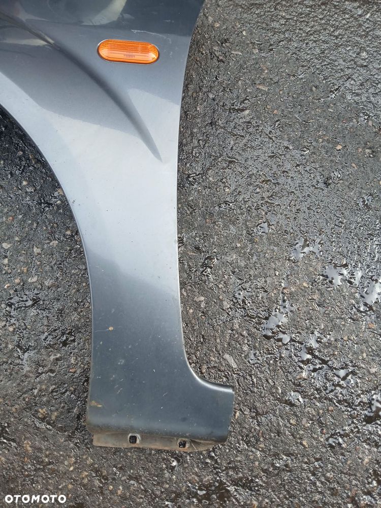 Ford Fiesta Mk6 Błotnik lewy - 5
