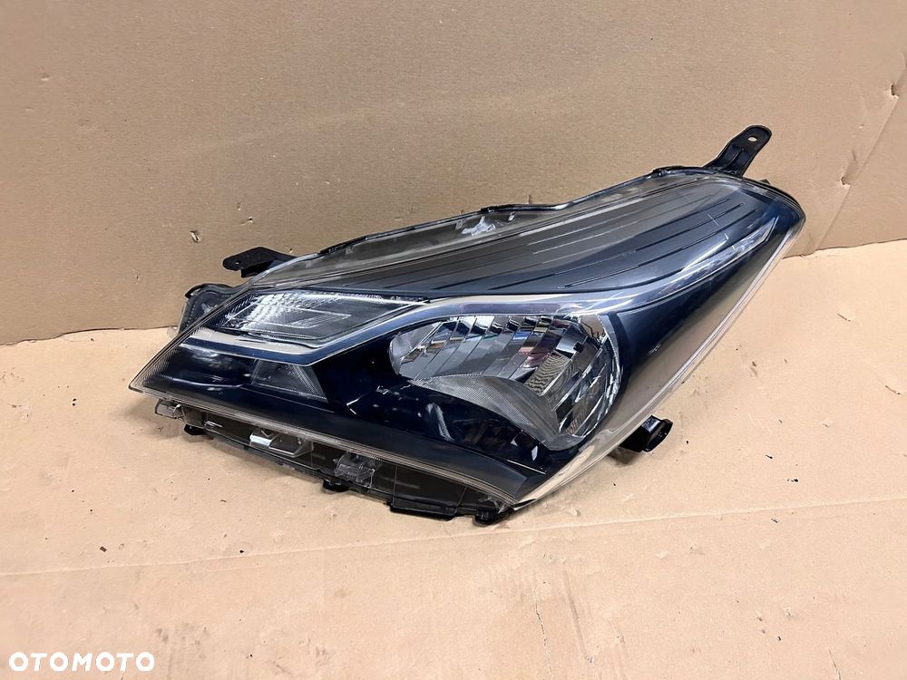 REFLEKTOR LEWY TOYOTA YARIS III LIFT - 1