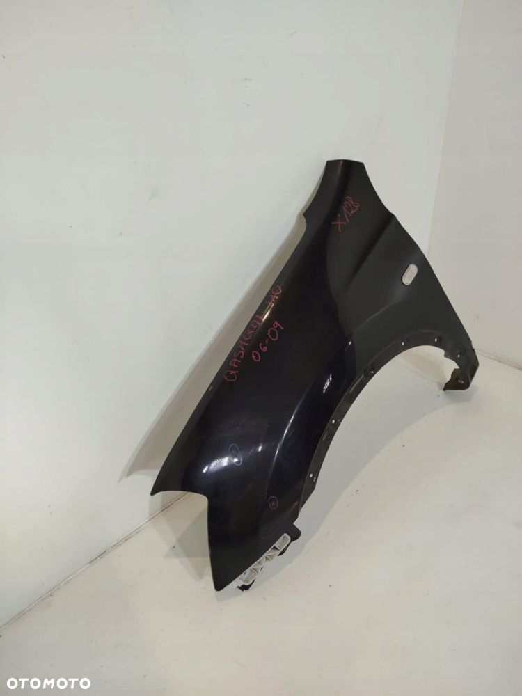 BŁOTNIK LEWY PRZEDNI PRZÓD NISSAN QASHQAI J10 06-09 - 2