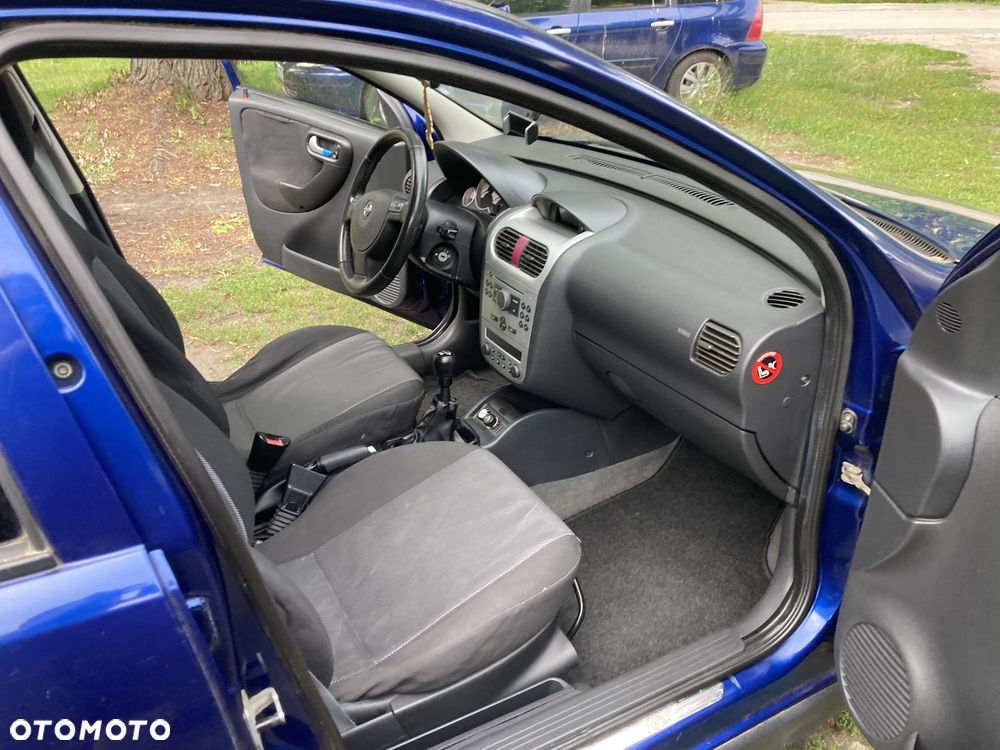 Opel Corsa 1.2 16V Cosmo - 7