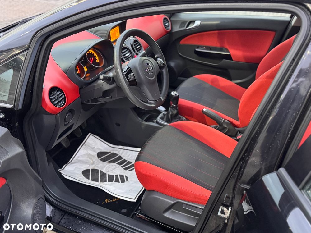 Opel Corsa 1.2 16V Cosmo - 9