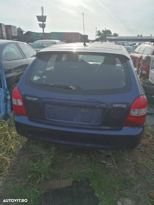 Dezmembrez Mazda 323 - 5
