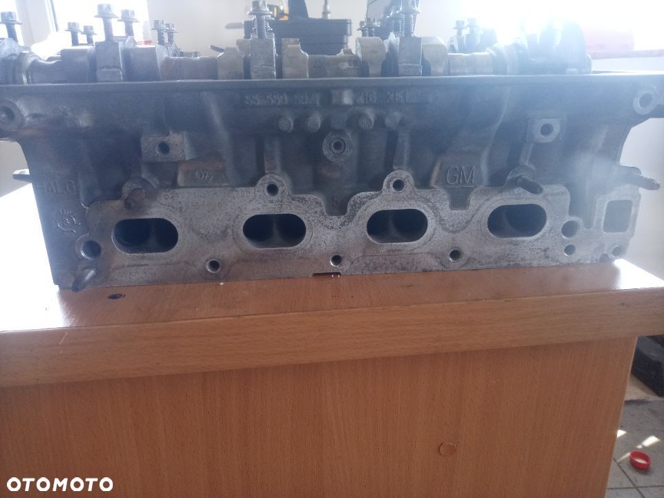głowica astra zafira b 1.6 16v z16xe1 55559597 - 3