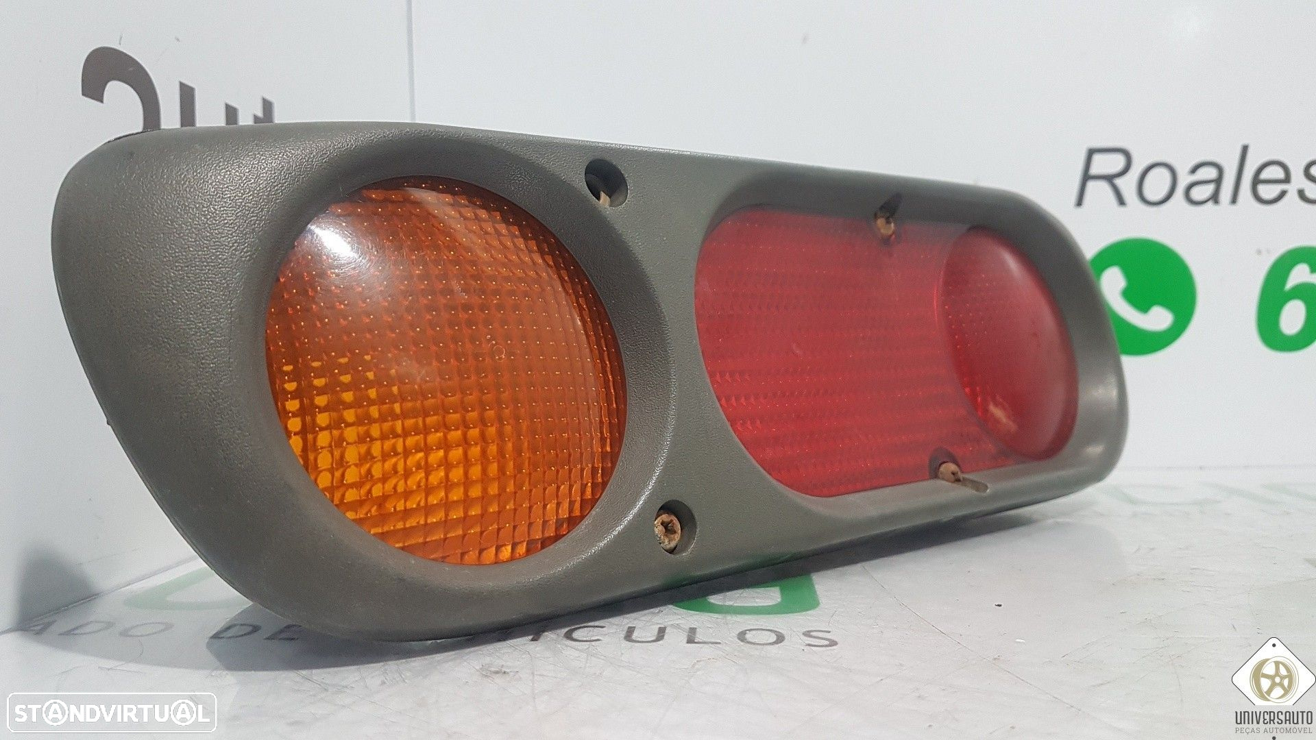 FAROLIM TRASEIRO ESQUERDO PARA-CHOQUES NISSAN TERRANO II 2001 - 2