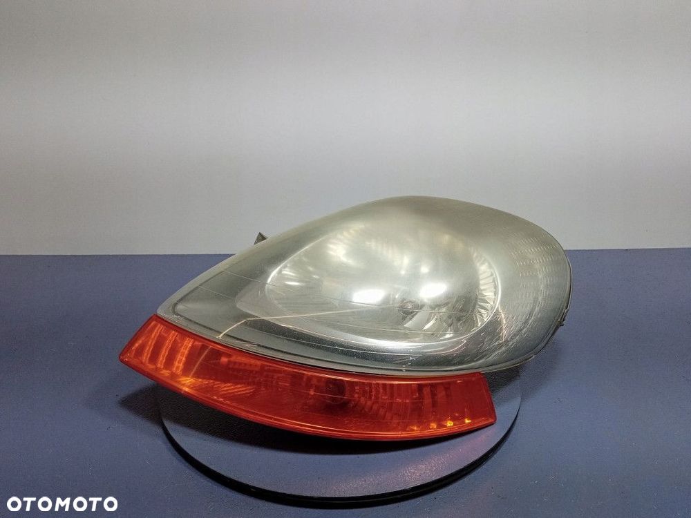 RENAULT TRAFIC II VIVARO A REFLEKTOR LEWY LAMPA PRZEDNIA 7700311371 - 1