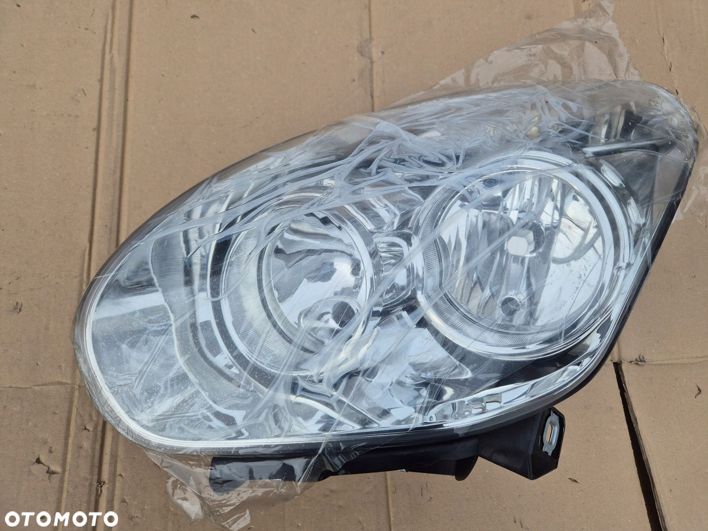 Fiat Doblo lampa lewa.2010-15.Combo 11-. Nowy oryg - 2