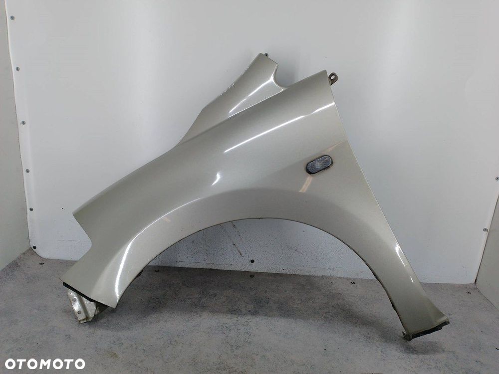 BŁOTNIK LEWY PRZÓD NISSAN TIIDA K32 - 1