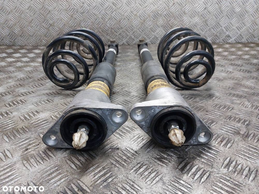 AMORTYZATORY + SPRĘŻYNY TYŁ KOMPLET VOLKSWAGEN PASSAT B5 SEDAN - 2