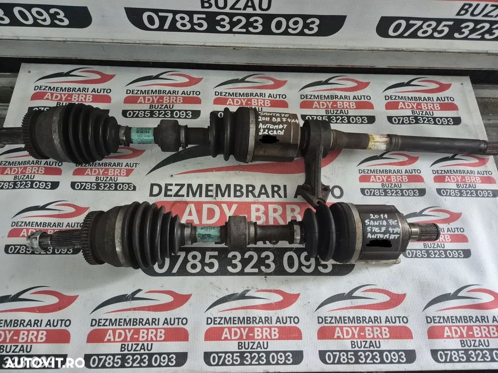 Planetara dreapta fata Hyundai Santa Fe 2 /2.2 cdi automat an 2011