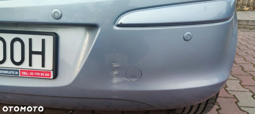 Opel Corsa 1.4 16V Cosmo - 5