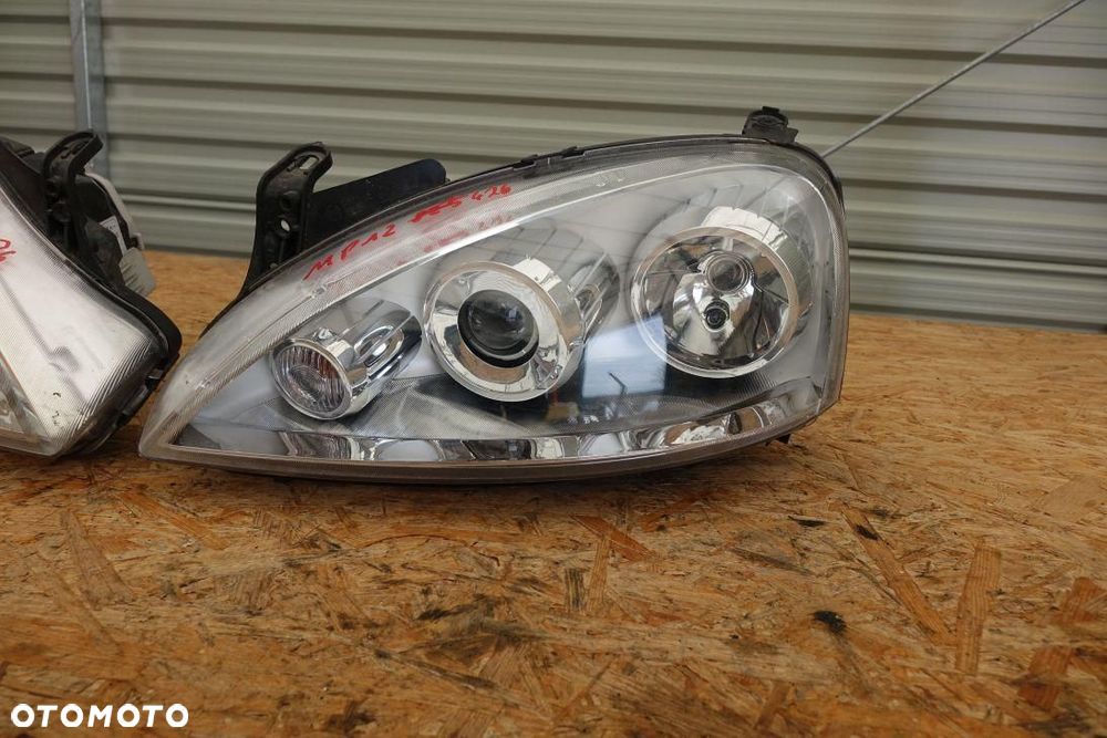 REFLEKTOR 2 LAMPY PRZÓD KPL EUROPA OPEL CORSA C LIFT 1321212 - 3