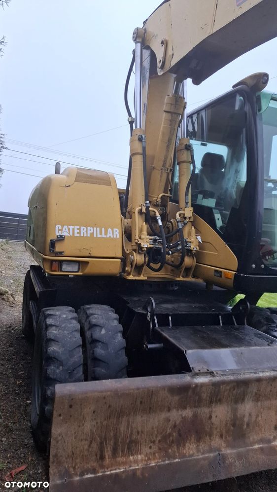 Caterpillar M313C - 6