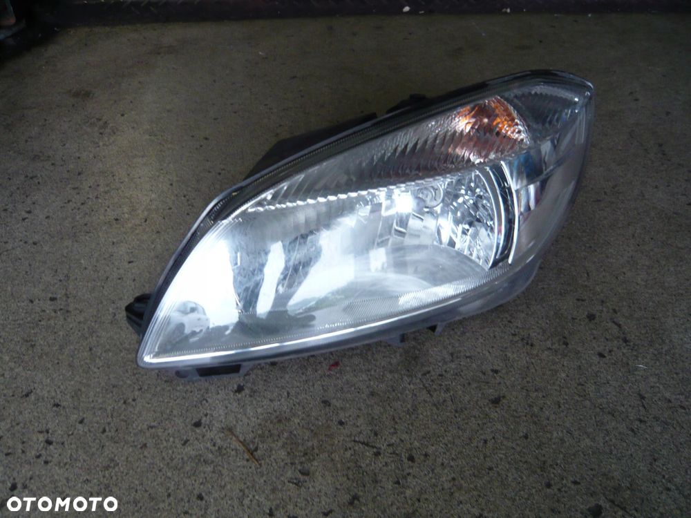 reflektor lampa lewa przód skoda fabia roomster lift - 1