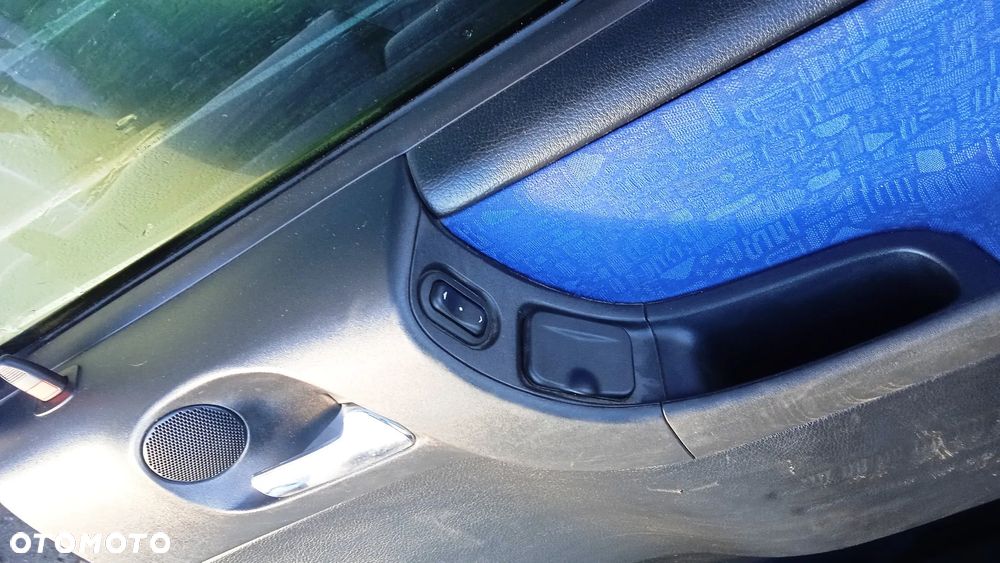 Drzwi lewe prawe przód tył szyba boczki panel mechanizm szyb lusterek lusterko Opel Zafira A Z20Q - 20