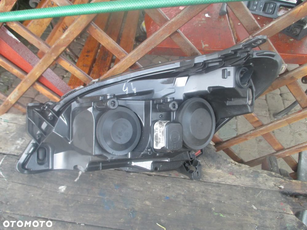 lampa prawa Opel Astra 3 H Hella orginał Europa - 5