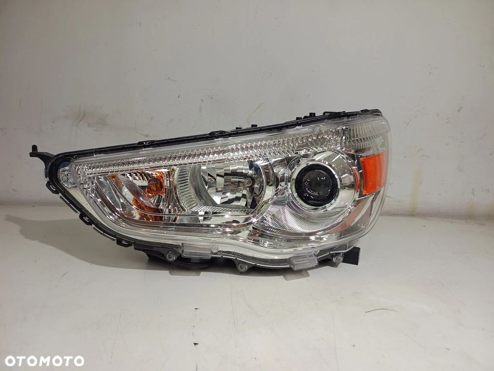 MITSUBISHI ASX 2010-2012 REFLEKTOR LAMPA LEWA  8301B587 - 2