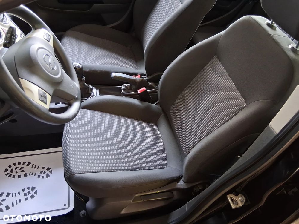 Opel Corsa 1.2 16V Enjoy - 10