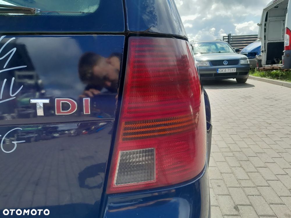 VW GOLF IV KOMBI LAMPA TYLNA PRAWA W BŁOTNIK - 1