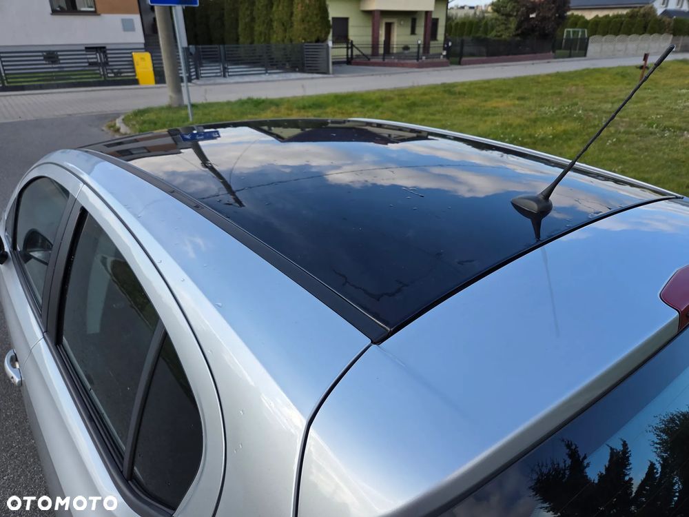 Opel Corsa 1.4 16V Edition - 14
