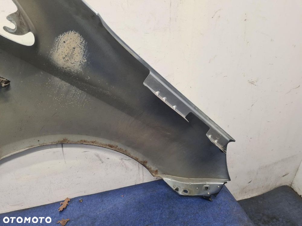 OPEL CORSA D BŁOTNIK PRZÓD LEWY - 9