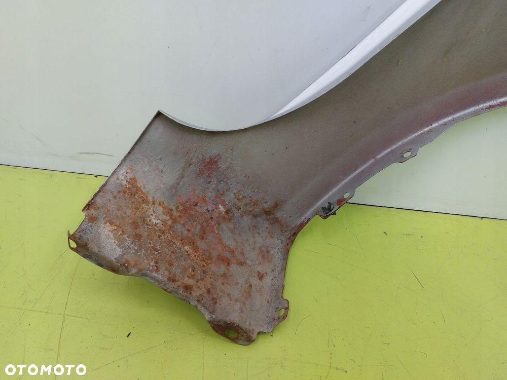 Błotnik przedni lewy Mitsubishi Colt Z30 2004-2012 A50 SREBRNY - 8