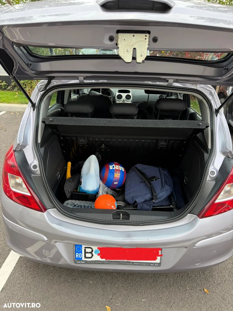 Opel Corsa 1.2i Cosmo - 11