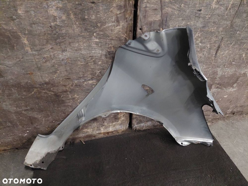 BŁOTNIK LEWY PRZÓD TOYOTA YARIS II LIFT 1F8 - 5