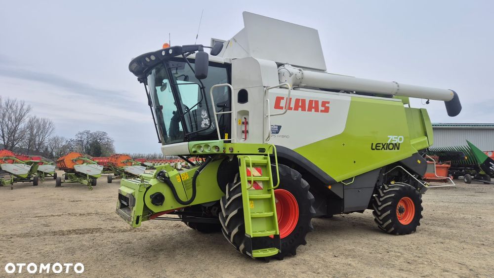 Claas Lexion 750 z hederem - 1