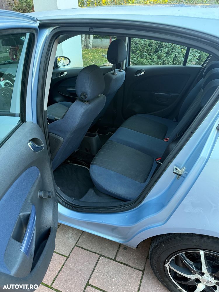 Opel Corsa 1.2i Cosmo - 8