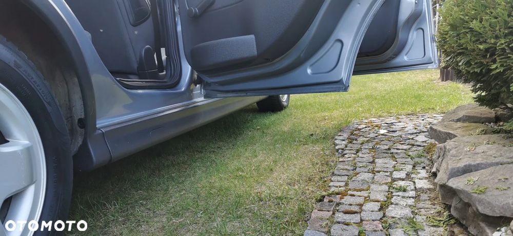 Opel Corsa 1.2 16V Enjoy - 21