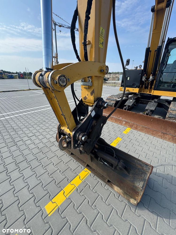 Caterpillar 310 - 13