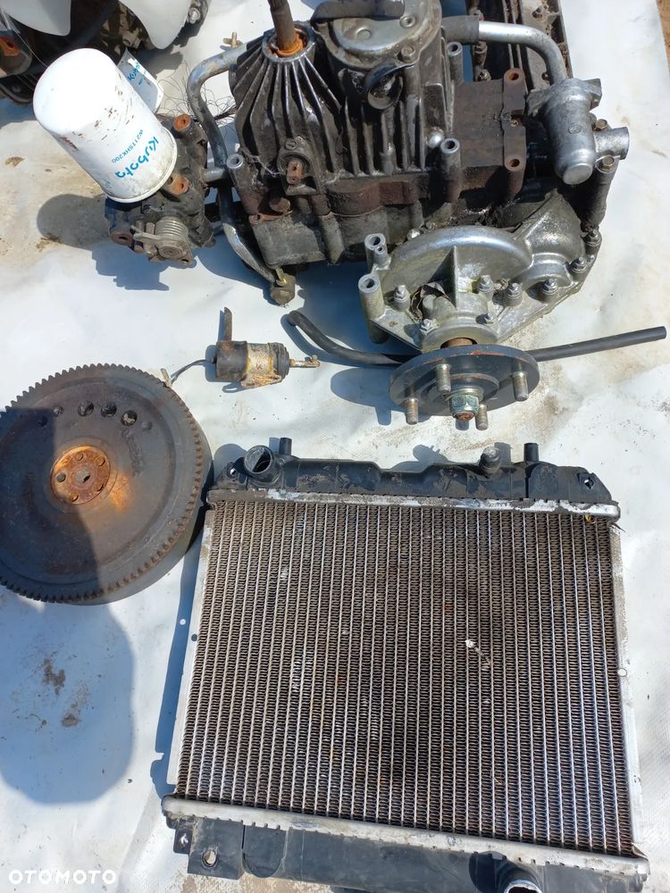 Części Kubota silnik Z602,chłodnica,koło zamachowe,wtrysk,napęd GR 2000,alternator,rozrusznik,piasta - 3