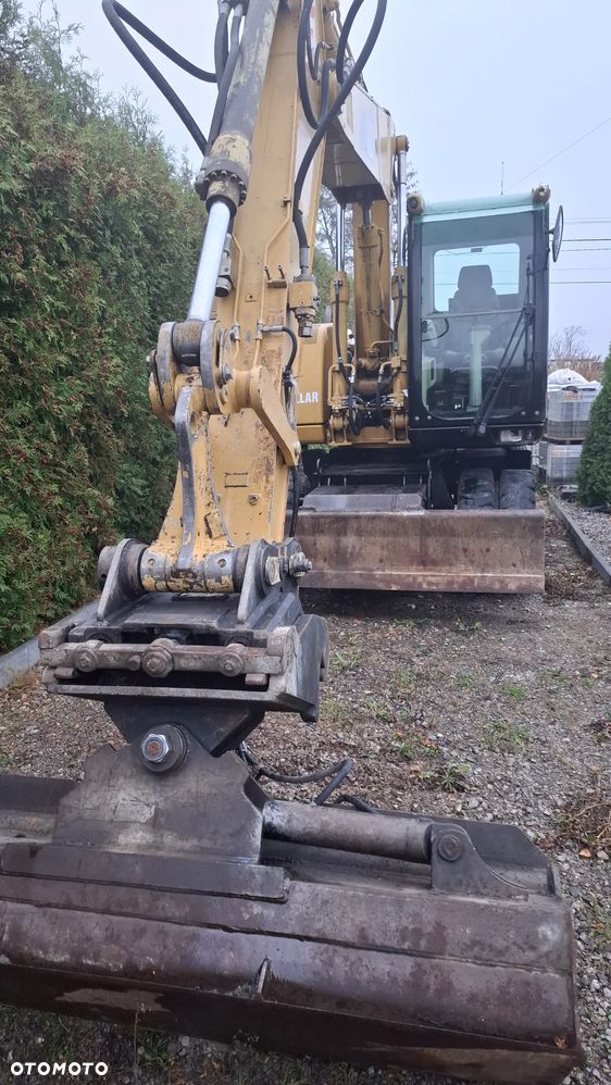 Caterpillar M313C - 11