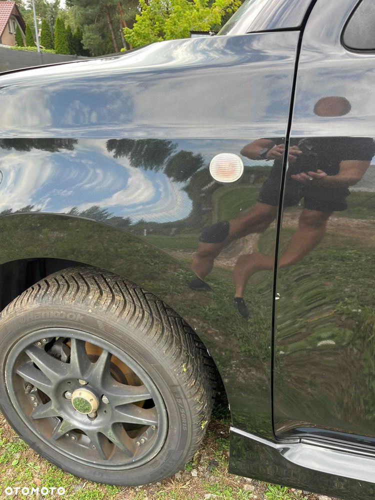 błotnik przód przedni lewy daihatsu materia x07 czarny 2006 - 2011 - 4