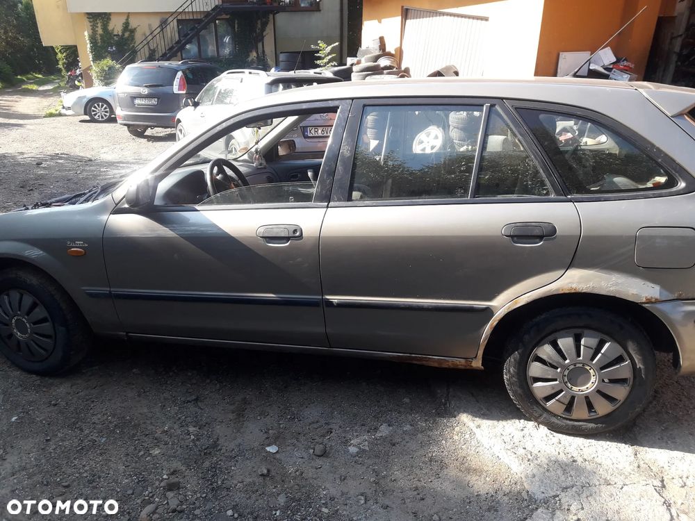 Mazda 323 323f BJ Premacy 2.0 ditd Chłodnica wody - 9