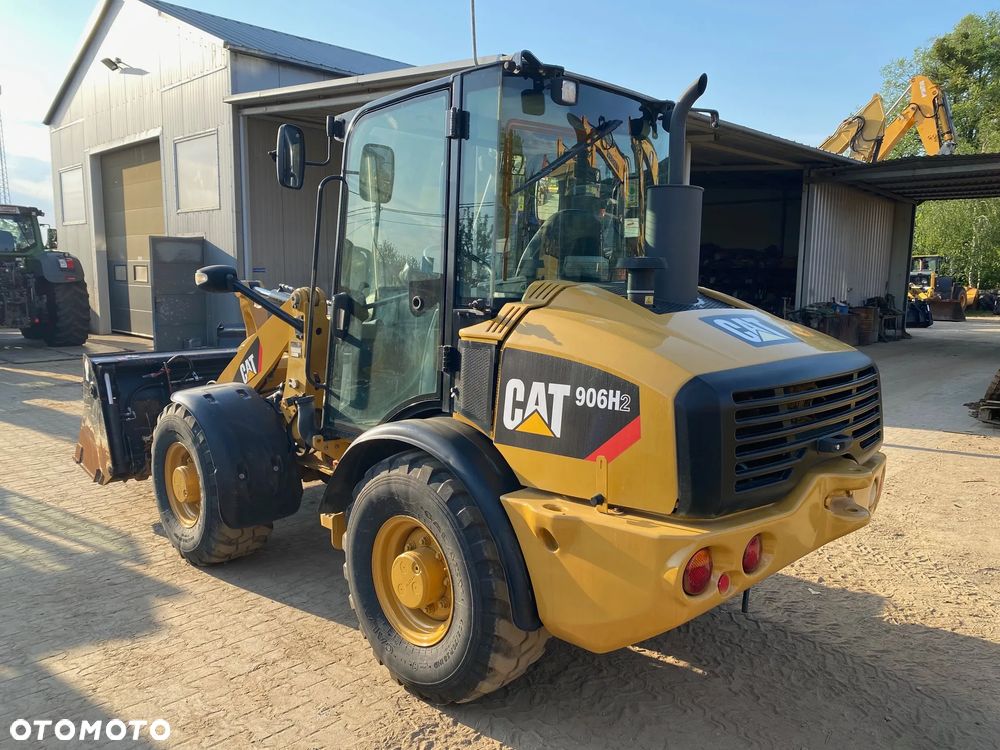 Caterpillar CAT 906H2, 2013 ROK, ŁYŻKA OTWIERANA + WIDŁY, z NIEMIEC, SUPER STAN, - 7