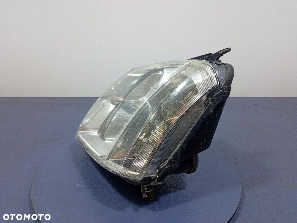 OPEL MERIVA A REFLEKTOR LEWY LAMPA EU 93321052 - 2