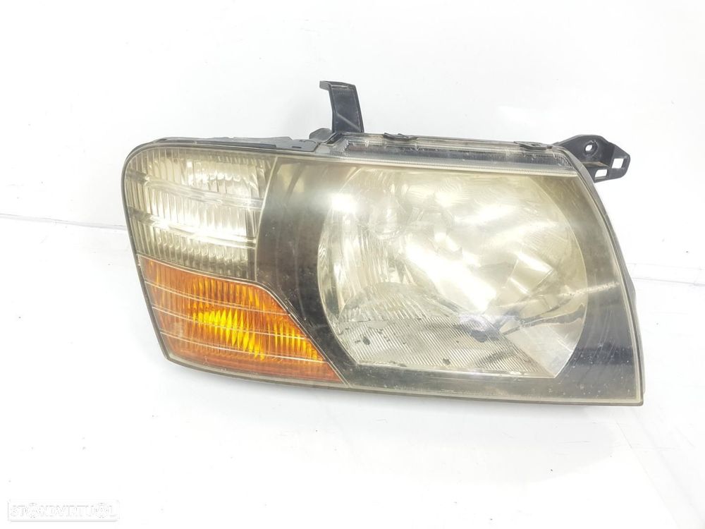 FAROL DIREITO MITSUBISHI MONTERO V60V70 - 1