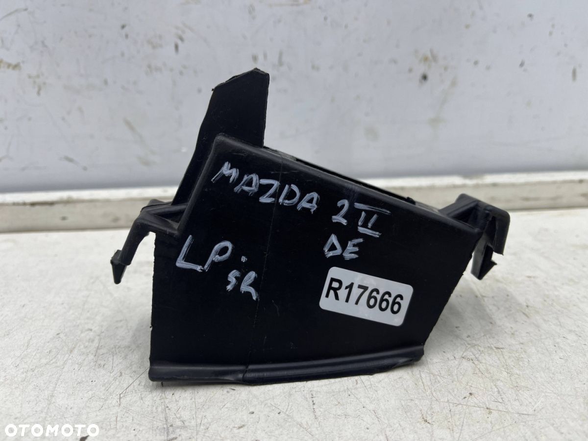 Ślizg Mazda 2 II DE DH 07-12r. lewe przednie środkowe mocowanie wspornik prowadnica zderzaka - 1