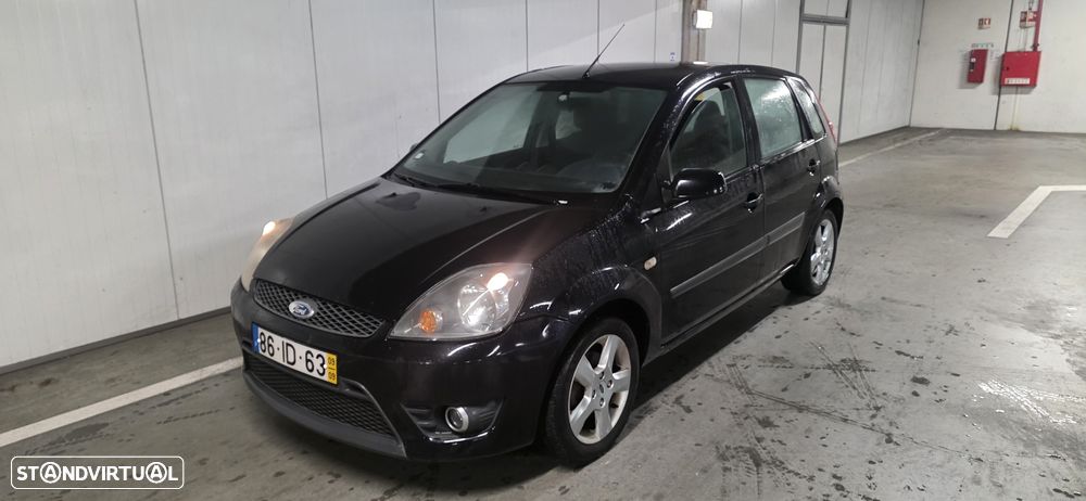 Ford Fiesta 1.25 Ghia - 11