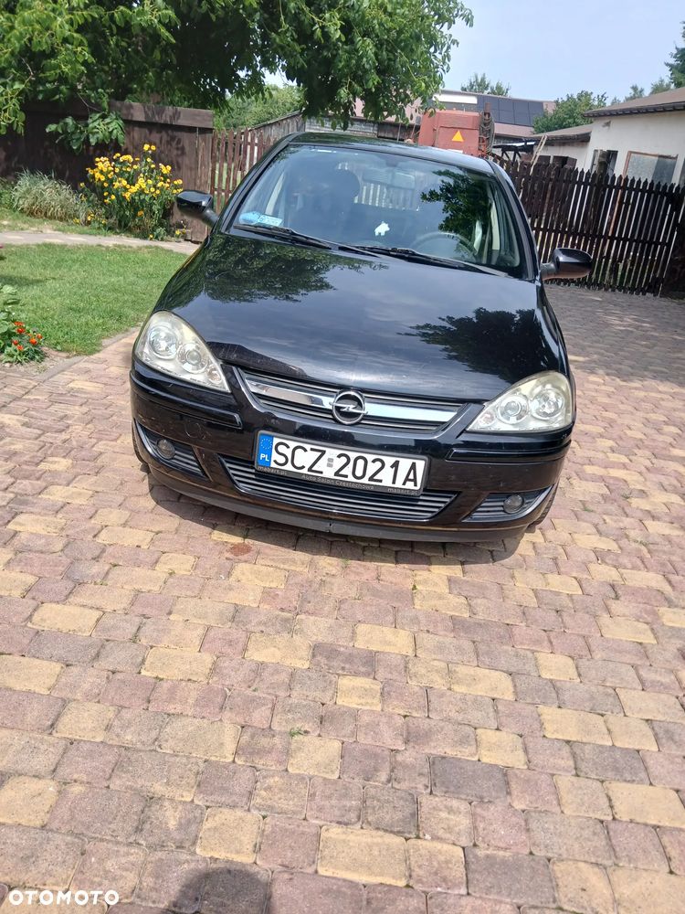 Opel Corsa 1.2 16V Cosmo - 1