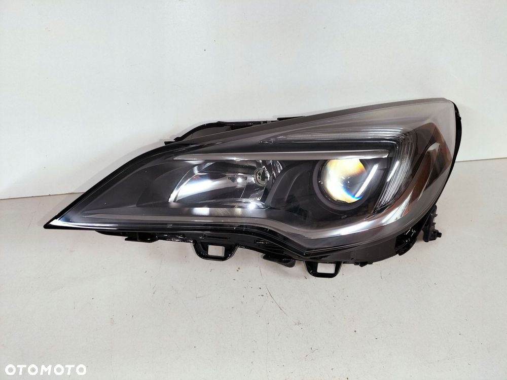 lampa przednia reflektor lewa opel astra v k 15- - 2