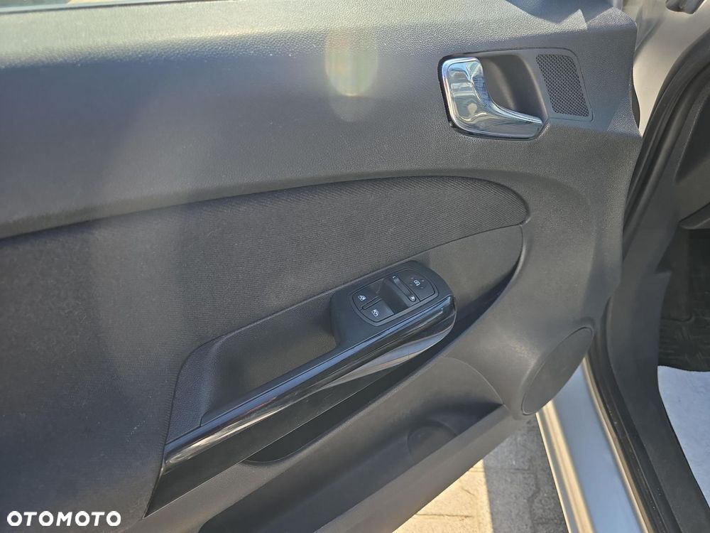 Opel Corsa 1.4 16V Enjoy - 10