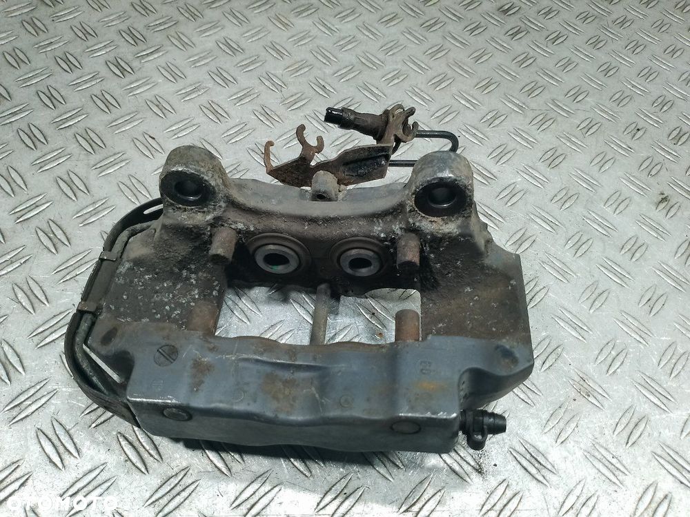 ZACISK HAMULCOWY PRAWY TYŁ AUDI Q7 (2005-2015) 2076730410 3.0 TDI - 4