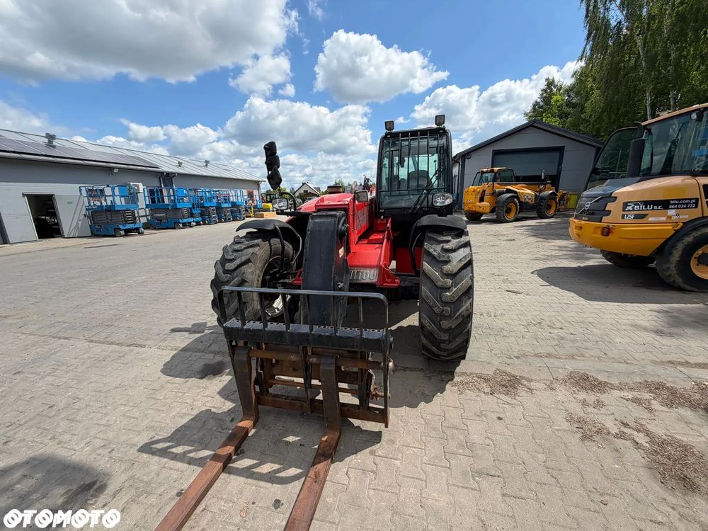 Manitou Mt 733 - 9