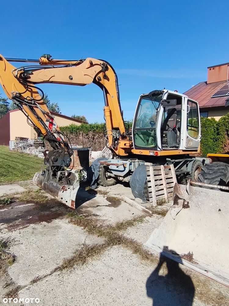 Liebherr A 311 Litronic - 2