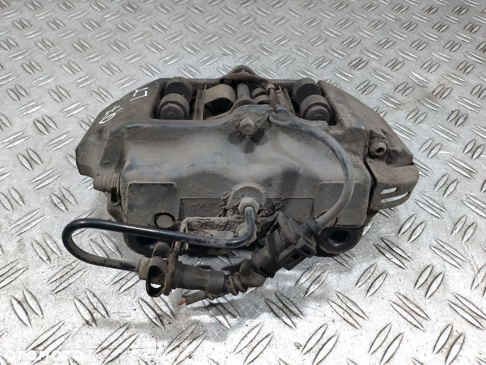 ZACISK HAMULCOWY LEWY TYŁ AUDI Q7 207673038 3.0 TDI - 4